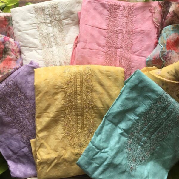 A Beautiful designer collection in Pure Chandheri Silk Top with beautiful Jamdhani weaving & embroidery , cotton bottom & a super stylish crepe silk Duppatta with floral prints & embroidery