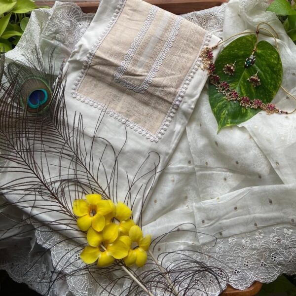 An ethereal collection in Offwhite & Antique gold in pure Chandheri silk top with Benarasi hand weaving & intricate French lace detailing , santoon bottom & a pure viscose organza Duppatta with Benarasi weaving & beautiful embroidery along borders