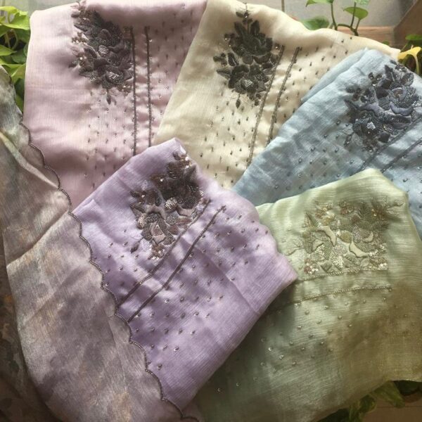 A Beautiful Collection in pure Chinni chiffon top with intricate hand embroidery , santoon bottom & a stunningly gorgeous pure chiffon floral Duppatta with hand worked scalloped borders