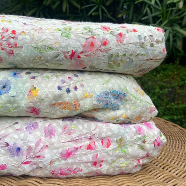 An ethereal Ivory Offwhite Running fabric in pure Cotton jacquard with beautiful floral prints giving it a vintage feel! The fabric can be cut in meterage as per your requirement. The fabric with beautiful floral prints is ideal to converted as a saree , suit , blouse , Duppatta or frock