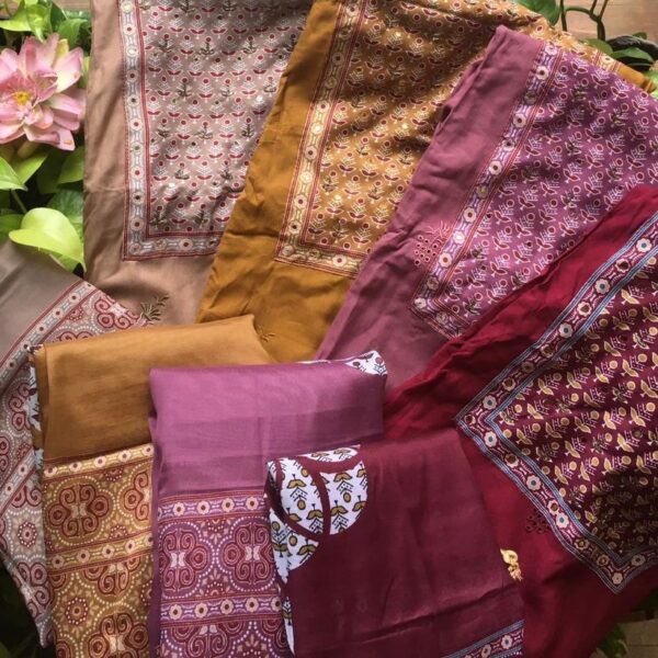 A beautiful collection in pure muslin suits with stunning Ajrakhs prints & hand embroidery on yoke , Cutwork Hakoba on body , beautiful borders for sleeves & body , cotton bottom & muslin printed Duppatta