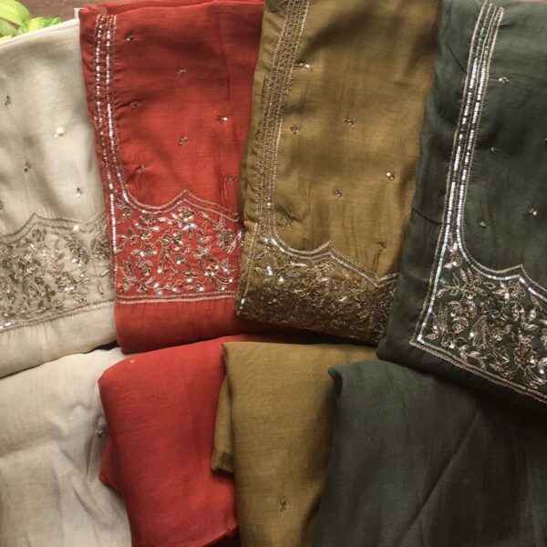 A beautiful collection of Pure Mal Chandheri Silk top & Duppatta with intricate hand embroidery featuring Zardosi work & cotton silk bottom