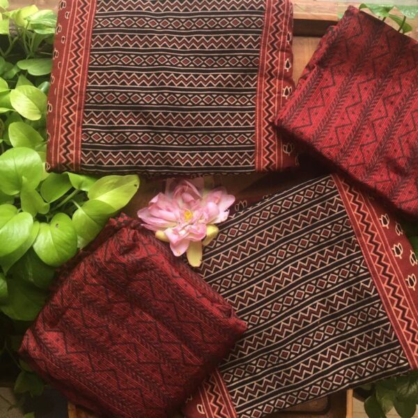 A beautiful collection of Pure Ajrak top with designer patterning in panelcut style , cotton bottom@& Kota silk Duppatta .Style these for a beautiful wear this Onam !