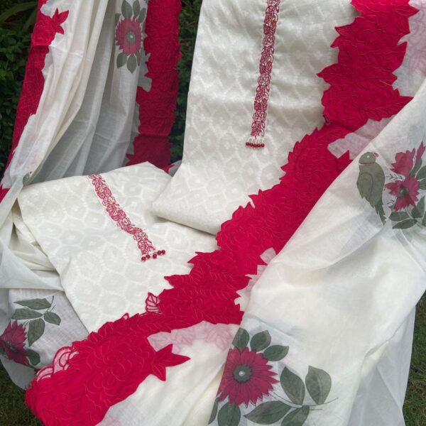 A beautiful new collection in Chandheri silk top with ethereal jamdhani hand weaving & floral embroidery & pearl work , with beautiful embroidery & a stunningly gorgeous designer Duppatta with floral appliqué .santoon bottom