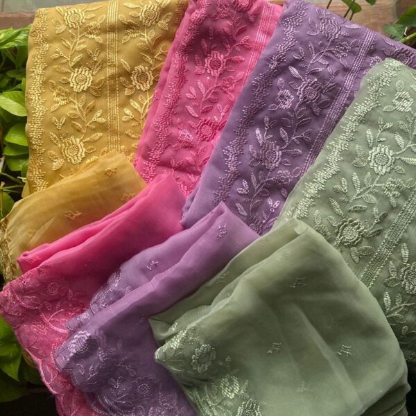 Presenting Our Beautiful New designer wear in chiffon top with exquisite embroidery on full top in a panel style giving the illusion of a princess cut, cotton silk bottom & a beautiful chiffon Duppatta with embroidery .