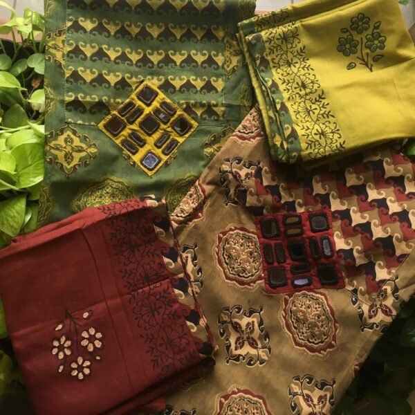 A beautiful collection of Pure cotton top with stunning Ajrak block prints and mirror work , cotton bottom and soft Mal cotton Duppatta with Ajrak borders A beautiful and classy attire for Onam :)