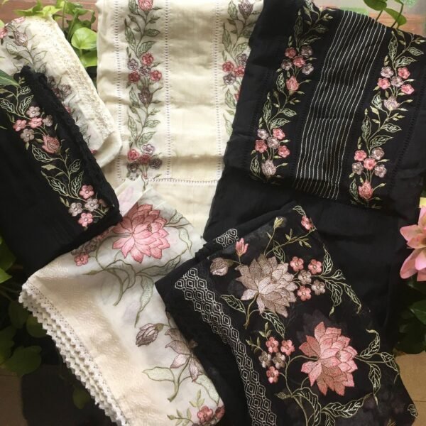 A stunningly gorgeous hand made pure Malai Chandheri silk top with intricate floral embroidery detailing on yoke , sleeve borders & on Santoon bottom as well. Duppatta is truly stunning with intricate embroidery . Premium & limited in numbers hurry before we run out of these