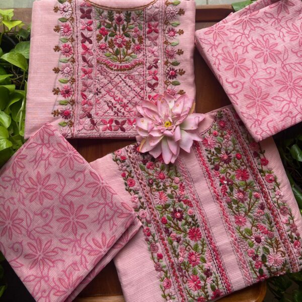 A stunningly gorgeous hand made matka silk top with intricate floral embroidery on yoke & sleeves, cotton bottom & matka silk Duppatta with block prints . Premium & limited in numbers hurry before we run out of these