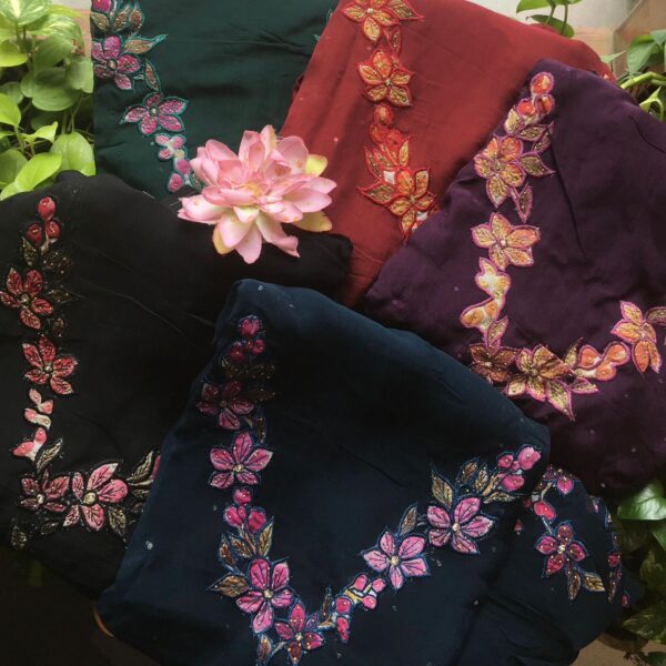 A stunningly gorgeous collection in silk organza top & Duppatta with beautiful appliqué work & santoon bottom