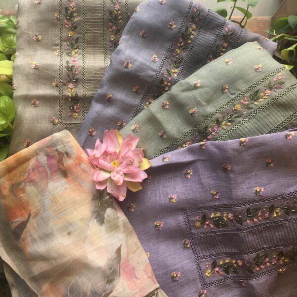 A beautiful collection of Linen top with beautiful embroidery all along top, santoon bottom & linen Duppatta with floral prints