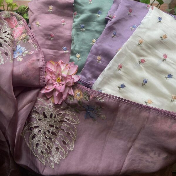 A beautiful collection of Organza top & Duppatta with beautiful floral embroidery all along top & Duppatta & santoon bottom.