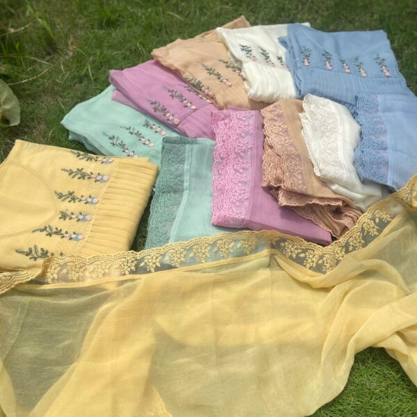 Presenting Our Beautiful New designer wear in Crush georgette top with exquisite hand embroidery on full yoke featuring bullion knots, additional lace for sleeve borders , cotton silk bottom & a stunning crush georgette Duppatta with French lace borders all around