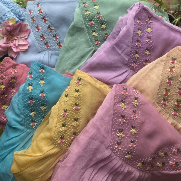 A Beautiful designer collection in Pure Crush Georgette top & Duppatta with exquisite hand embroidery featuring bullion knots & pearl embroidery, fine French lace borders for Duppatta & cotton silk bottom