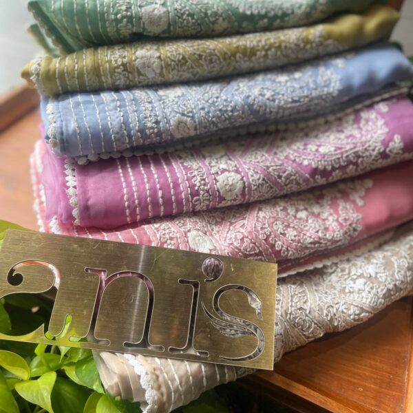 A stunningly gorgeous premium soft organza saree beautiful Chikankari embroidery all along saree , blouse & pallav. The saree is delicately adorned with a gorgeous floral Handworked blouse on soft easy to drape organza making it a beautiful choice for gifting your dear ones this Christmas season