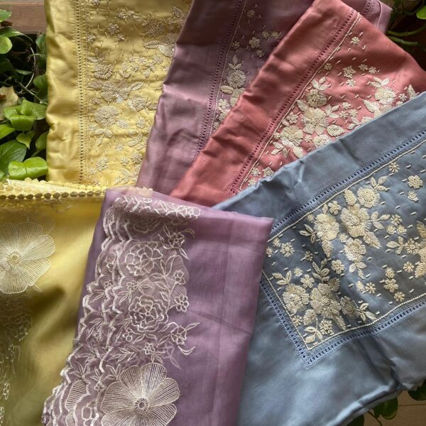 A beautiful collection of Pure Benarasi Chandheri Silk top with exquisite pearl embroidery , embroidery on sleeve ends , santoon bottom with embroidery and organza Duppatta with embroidery