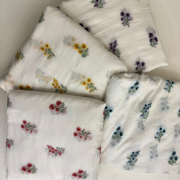Running fabrics in pure Mal cotton with the most dainty floral Embroidery!You can avail a minimum of half metre to the no of metres you require to design your attire !