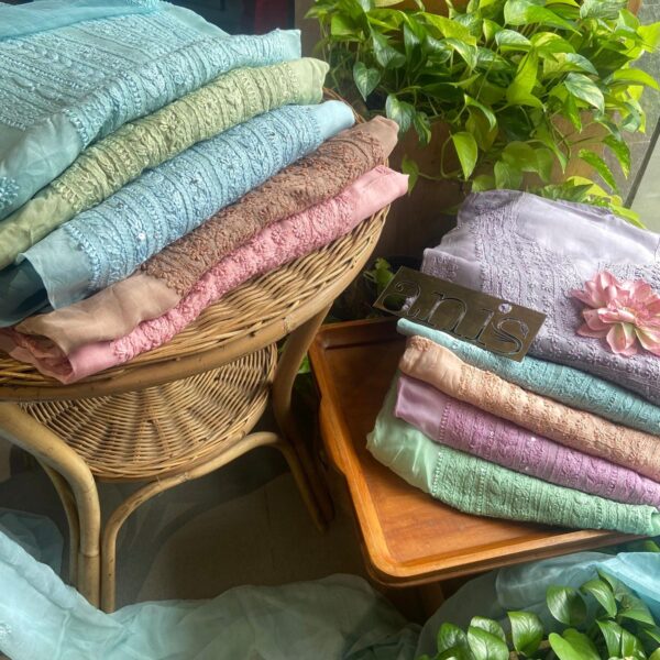 A beautiful premium collection of pure silk organza top and chiffon Duppatta with very pretty Lucknow Chikankari hand embroidery and ombré dyeing and santoon bottom. Chikankari ombres are very stylish and a must have in your wardrobe! Hurry we have limited numbers