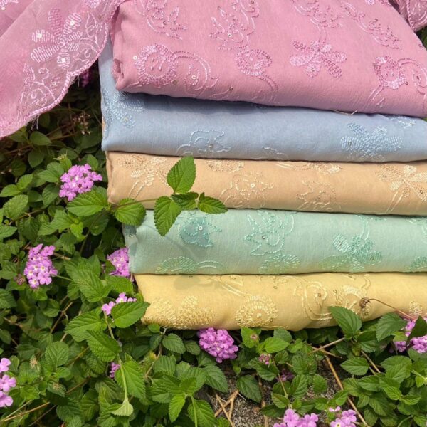 A beautiful Designer collection of Chiffon Suits with Chikankari Reminiscent Embroidery on top & Duppatta & cotton silk bottom. The beautiful pastel tones and exquisite embroidery makes these the perfect gifting choice this festive season