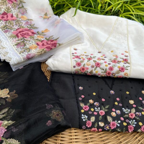 A beautiful premium collection of pure Benarasi Chandheri silk top with intricate hand embroidery featuring bullion roses, embroidery on sleeve ends & santoon bottom with embroidery & organza Duppatta with exquisite floral cross stitch embroidery as well ! Hurry & order these before we run out of them
