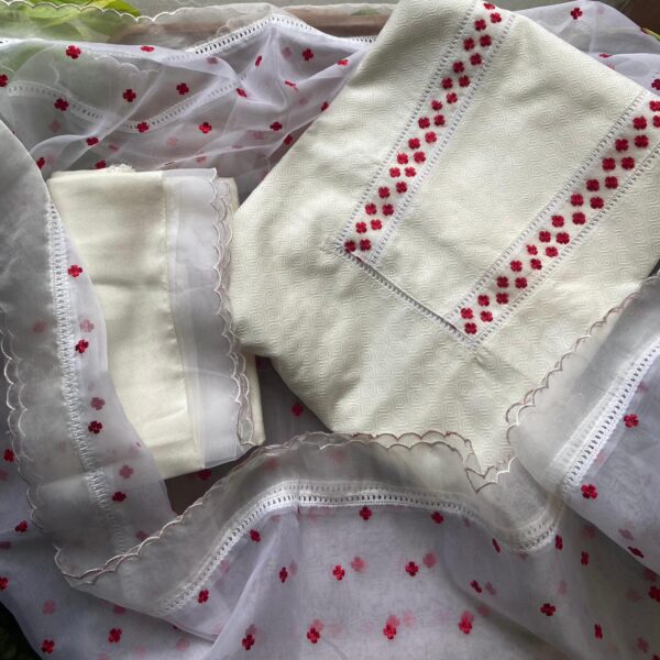 A beautiful premium collection of pure chandheri silk top with exquisite embroidery at yoke portion defined by fine crochet , embroidered organza sleeve borders , santoon bottom with organza embroidery patch & completely embroidered organza duppatta ! Hurry & order these before we run out of them