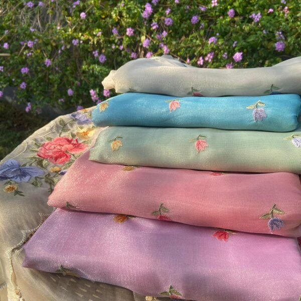 A beautiful collection of shimmer organza top & Duppatta with Beautiful floral embroidery & Cutwork. Cotton silk bottom !!! Limited pieces available!!!Hurry & order these before we run out of them! Perfect choice for gifting your dear ones this festive season