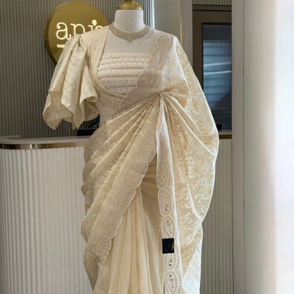 ☘️ Presenting a Beautiful Pure Silk Organza Saree with intricate Chikankari embroidery and Zari embroidery borders throughout The pallav is completely covered with embroidery and paired with a beautiful Benarasi blouse piece . Exclusive piece available!!!