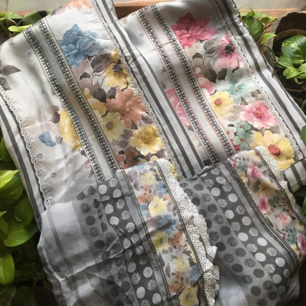 Are you looking out for Beautiful & Unique Designer Floral Suits to add to your wardrobe ? These Exclusive Pure Muslin Suits are true stunners with very unique floral prints , contemporary stripes & French lace detailing. Style them with stylish pants to have a show stopper attire in your wardrobe. Pure Muslin silk top & Duppatta & santoon bottom