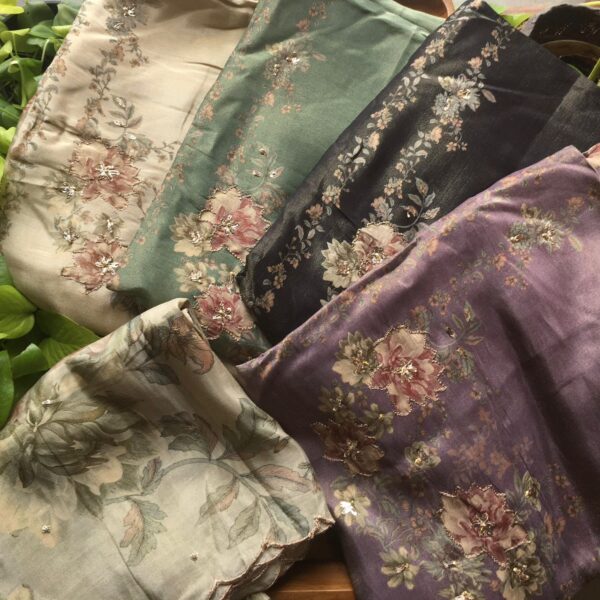 Are you looking out for Beautiful Floral Suits to add to your wardrobe ? These beautiful Tissue Silk Suits are the perfect choice ! Pure tissue silk top & Duppatta with gorgeous floral prints & Zari embroidery detailing & santoon bottom