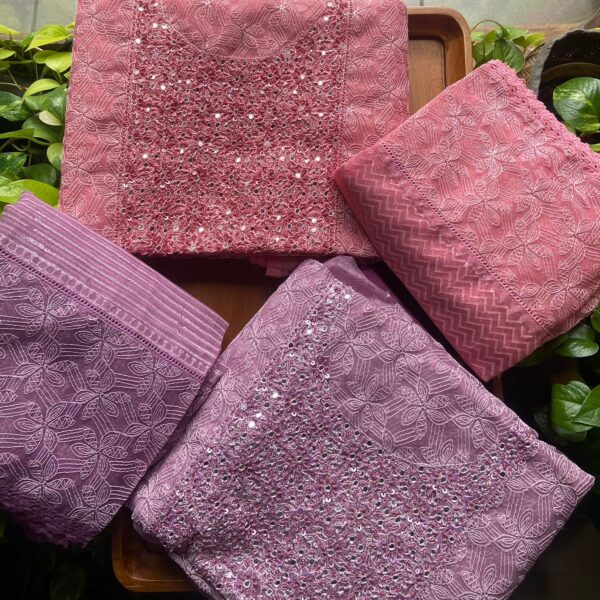 A stunningly gorgeous organza top & Duppatta with Tepchi Chikankari embroidery & exquisite hand embroidery on yoke & cotton bottom