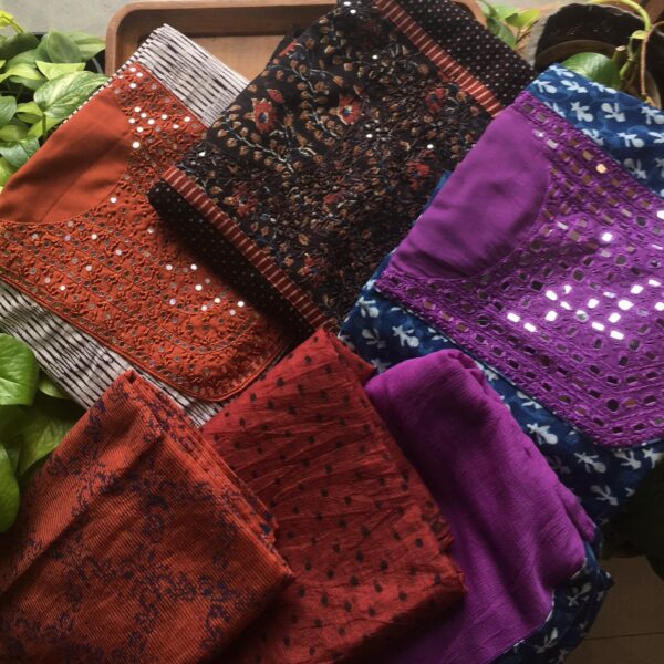 Are you looking out for Beautiful & Unique Designer wear suits in cotton to add to your wardrobe ? These Kutch worked cottons are the perfect choice!Pure Cotton top with authentic Kutch, cotton bottom & Kota Doria Duppatta