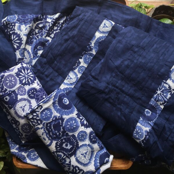 Are you looking out for Beautiful & Unique Cotton Suits to add to your wardrobe ? These Indigo cotton suit top with pintucks detailing is the perfect choice! Pure cotton top with pintuck detailing , cotton printed bottom & printed Duppatta