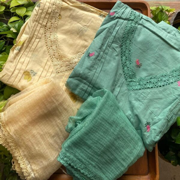 Are you looking out for BeautifulMuslin Suits to add to your wardrobe ? These designed suits are the perfect choice! Pure Muslin top with embroidery & pintucks patterned on top, cotton bottom & Kota Doria Duppatta