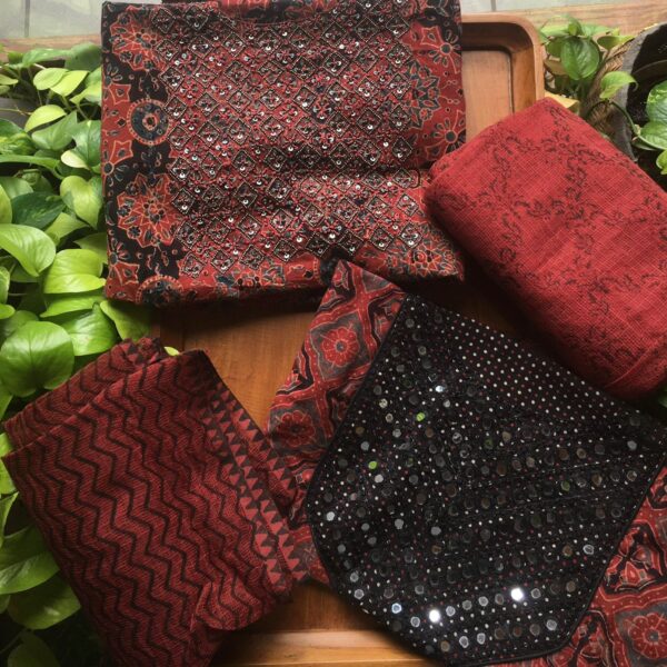 Stunning Rust toned pure Ajrak cotton top with intricate embroidered yoke , cotton bottom & chiffon /kota Doria Duppatta