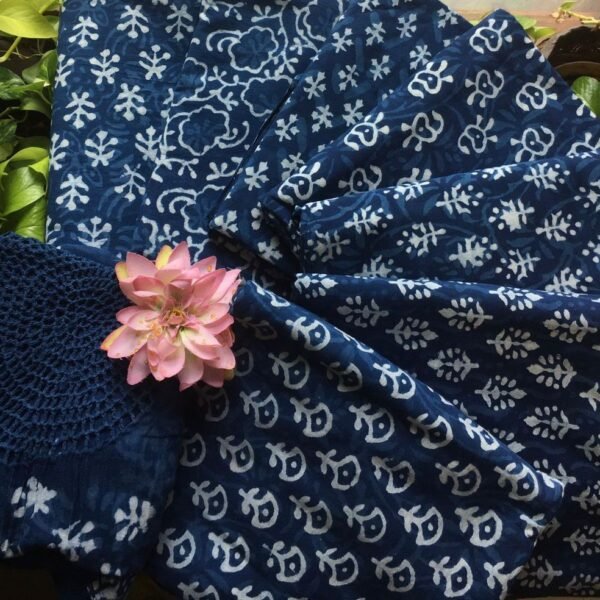 Are you looking out for Beautiful Indigo cotton crochet suits to add to your wardrobe ? These stunning indigos suits with hand crochet is the perfect choice! Pure cotton top with pretty prints, cotton bottom & pure Mal Duppatta with hand crochet