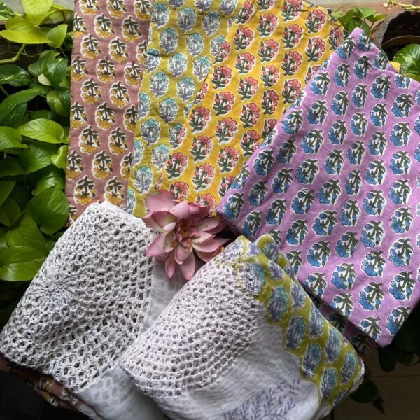 Are you looking out for Beautiful cotton suits to add to your wardrobe ? These suits with beautiful floral prints is the perfect choice! Pure cotton top with pretty floral prints , printed cotton bottom & pure Mal duppatta with floral prints& hand crochet